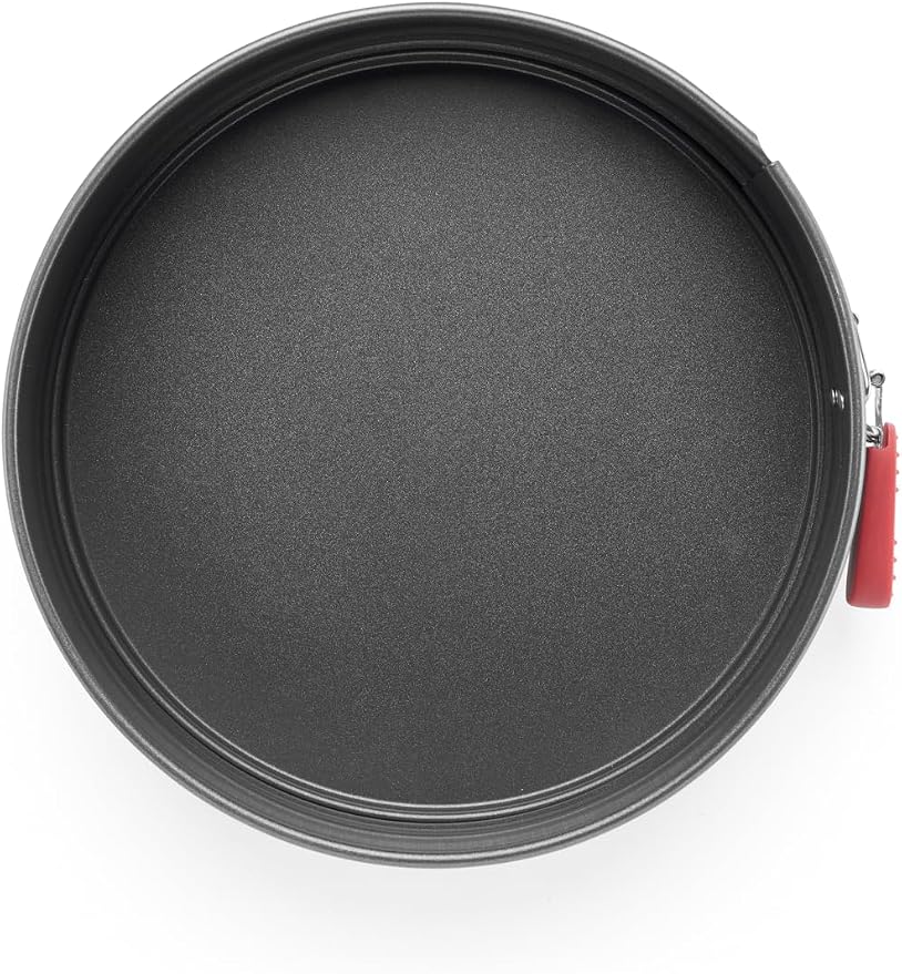 Lékué Non-Stick Round Springform Cake Tin - 9.5" Carbon Steel Oven Baking Pan with Platinum Silicone Handle, Even Heat, Dual Non-Stick Ceramic Coating, Scratch Resistant, PFOA & PFA-Free, 9.6x10x2.8"