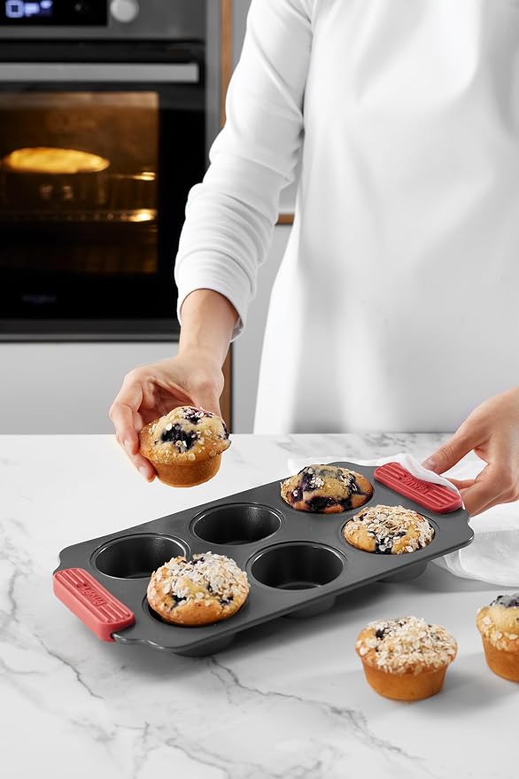 Lékué Non-Stick 6 Hole Muffin Mold - Carbon Steel Oven Baking Pan with Platinum Silicone Handles, Even Heat, Dual Non-Stick Ceramic Coating, Scratch Resistant, PFOA & PFA-Free, 12.2 x 7.1 x 1.5"