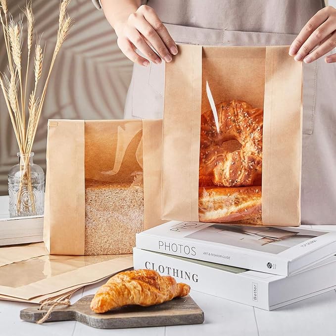 PAICUIKE 100 Pack Large Kraft Paper Bread Bags for Homemade Bread Sourdough Bags 13.7" x 8.2" x 3.5" with Tin Tie Tab Lock Clear Front Window Bakery Bag Packaging Cookie Bag with Label Seal Stickers