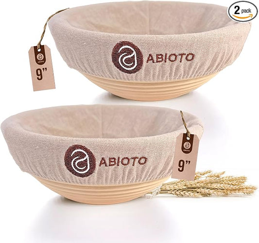 ABIOTO Bread Proofing Baskets for Sourdough Bread Baking - Set of 2 9" Round Banneton Baskets with Liners, Made of Finest Indonesian Rattan - Bake Perfect Artisan Bread Loaves at Home Like a Pro