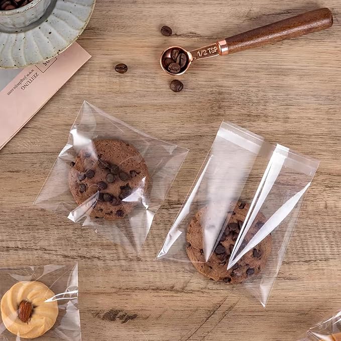 SUREHOME Cookie Bags with Seal 100 Pcs 4 x 4 In Clear Self Sealing Cellophane Bags for Cookie Packaging Small Treat Bag Self Adhesive Individual Cookie Wrappers Gift Giving Candy Baked Goods Sleeves